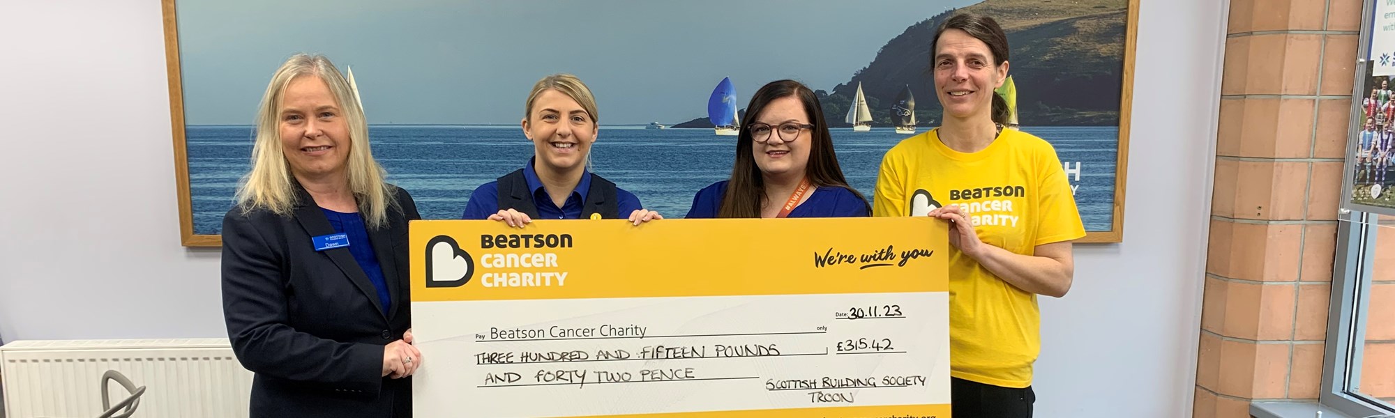 Background image: Colleagues in our Troon Relationship Centre have been fundraising for Beatson Cancer Charity 