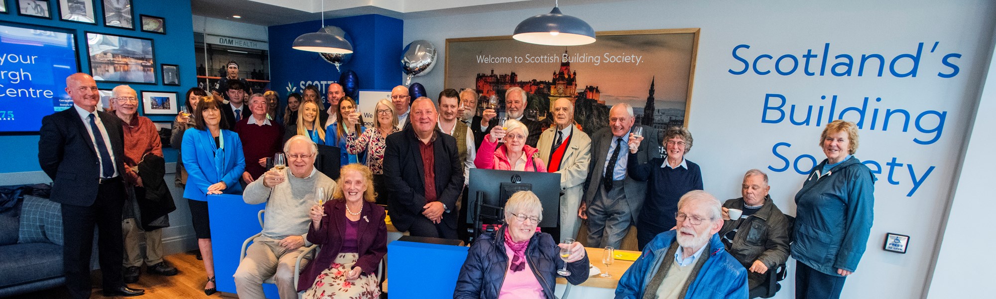 Background image: Members raised a glass to our new Edinburgh Relationship Centre 
