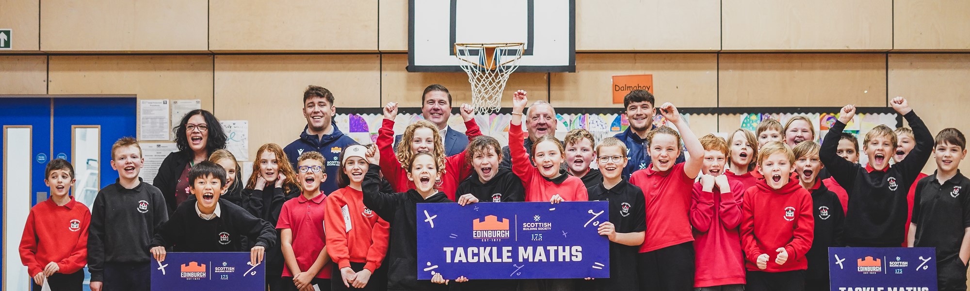 Background image: We're helping primary school pupils across Scotland  'Tackle Maths'.